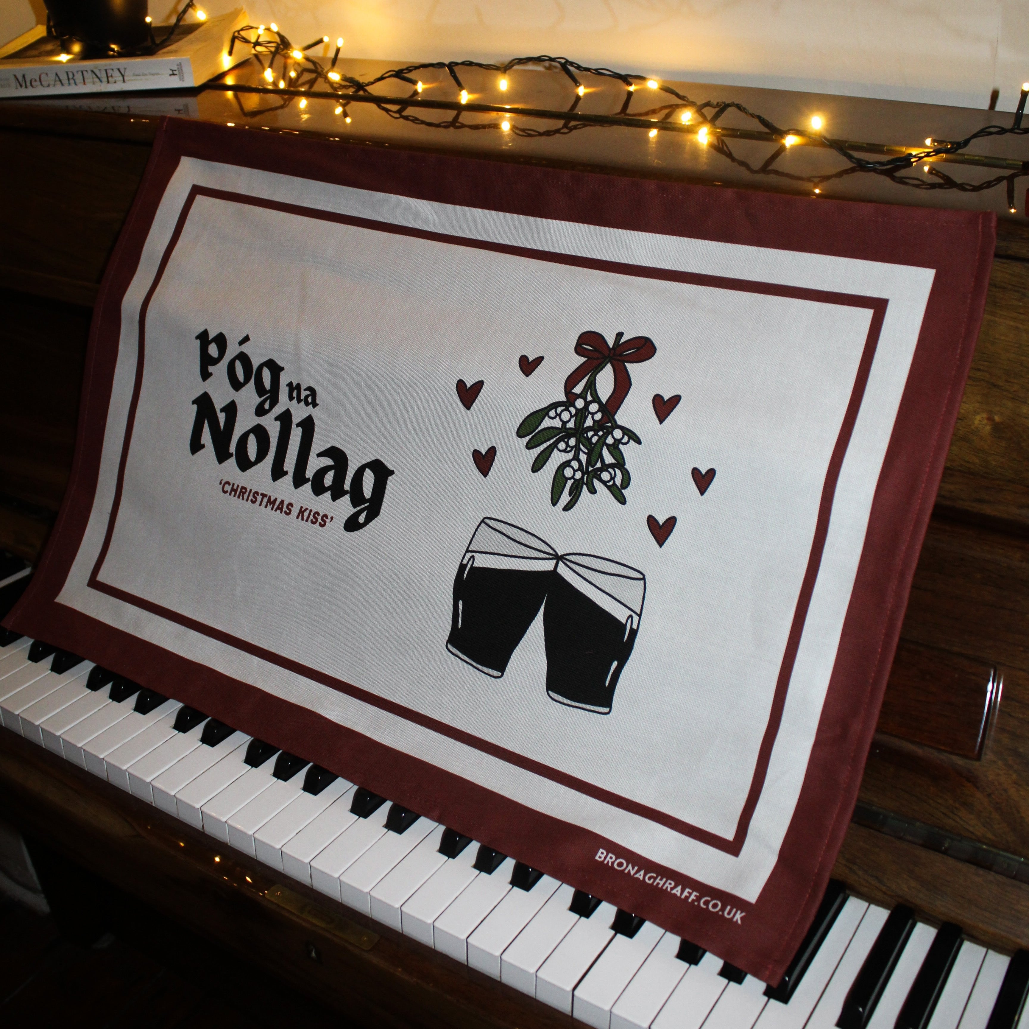 Póg na Nollag Christmas Kiss Irish Tea Towel by bronaghraff