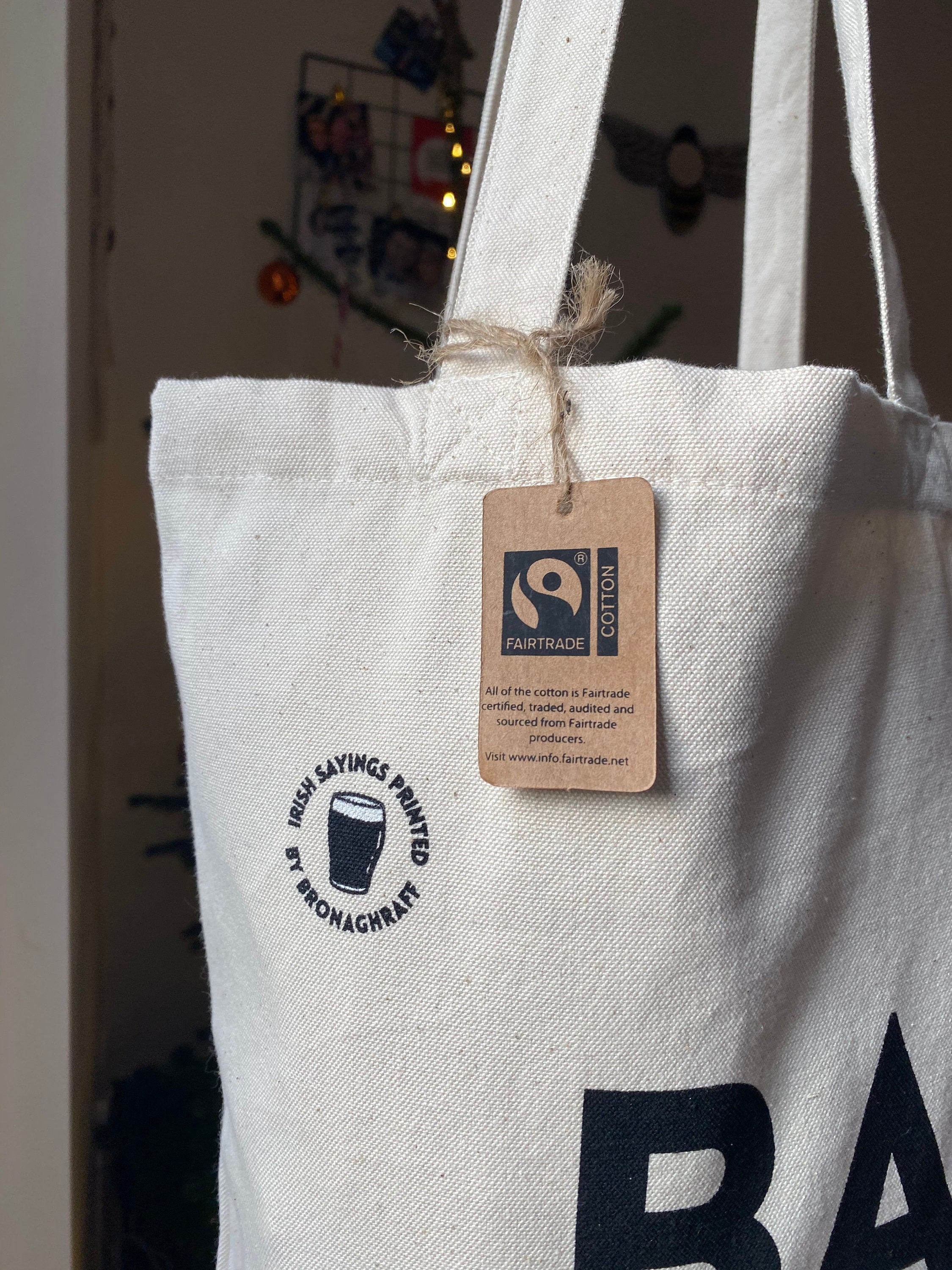 FAIR TRADE TAG ON BAG OF CANS IRISH TOTE BAG