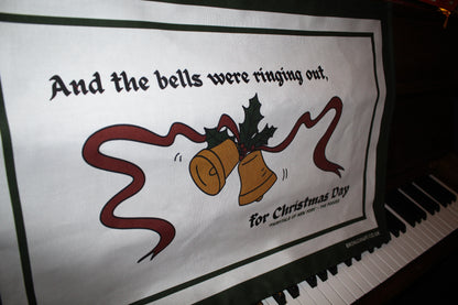 Hand-drawn Irish tea towel with festive bells and Pogues lyrics to the Fairytale of New York